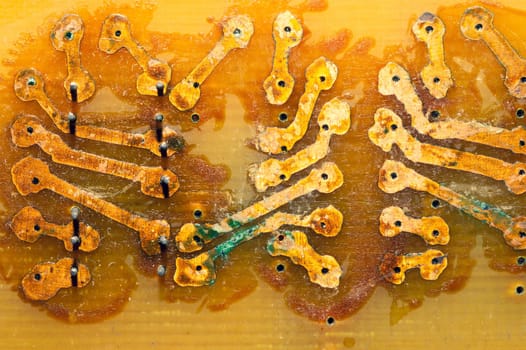 Handmade circuit board with copper tracks. industrial background. radio engineering background. textolite with soldering