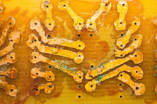 Handmade circuit board with copper tracks. industrial background. radio engineering background. textolite with soldering