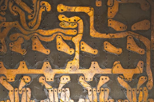 Handmade circuit board with soldered copper tracks. industrial background. textolite with soldering