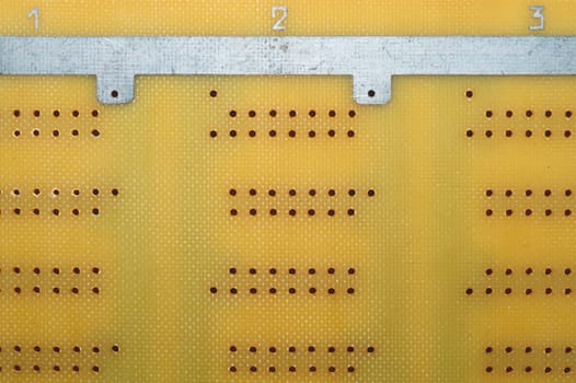 Dotted textolite surface. template for soldering the circuit. perforated background