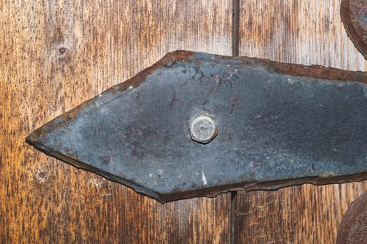 Detail of forged iron latch. old handwork forging