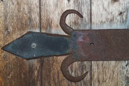 Detail of forged iron latch. old handwork forging