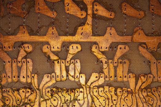 Handmade circuit board with soldered copper tracks. industrial background. textolite with soldering