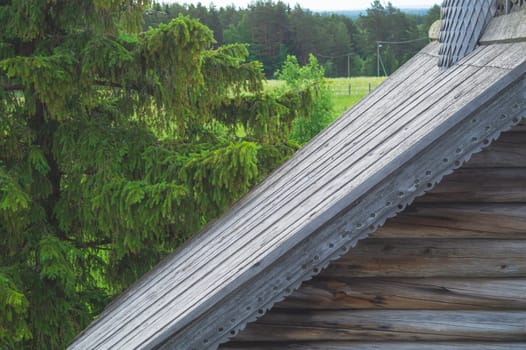 Detail of the old roof of an old wooden house. traditional architecture