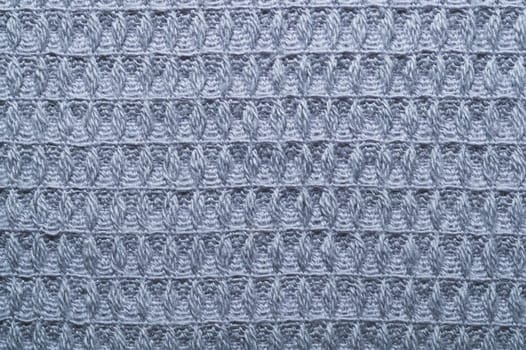 Gray fabric texture macro. textile background. knitted pattern. woven material
