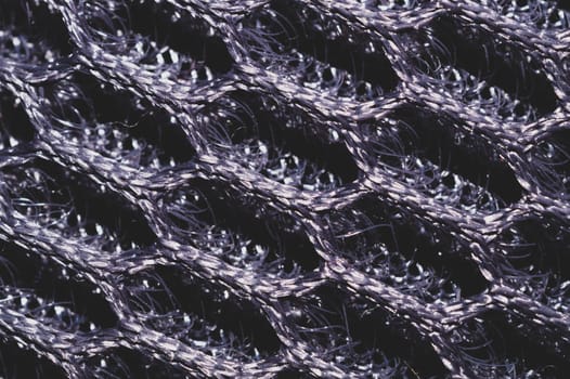 Gray fabric texture close up. textile background. knitted pattern. woven material