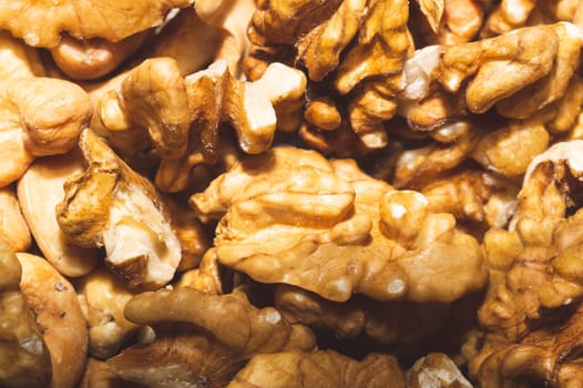 Peeled walnuts. heap of nuts close up