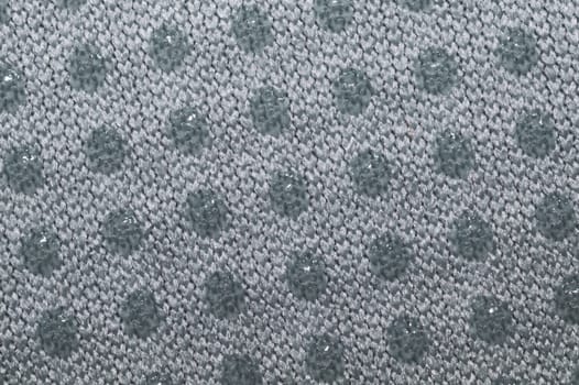 Fabric texture with dots close up. woven background. braided surface