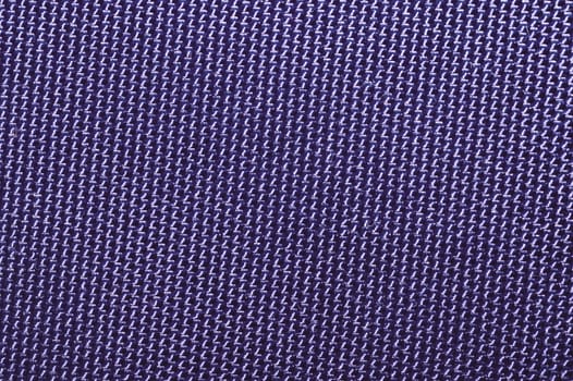 Fabric texture close up. woven background. braided surface. stitches of thread