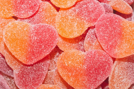 Marmalade in heart shape. candies with jelly and sugar lose up