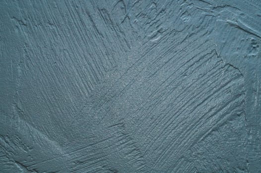 Gray concrete texture. rough painted background. uneven cement wall close up
