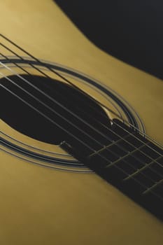 Acoustic guitar close up. musical instrument. strings on the guitar neck