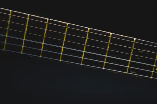 Acoustic guitar neck close up. guitar strings macro. musical instrument