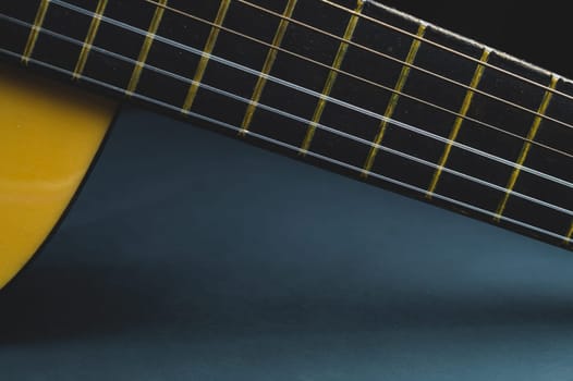 Acoustic guitar neck close up. guitar strings macro. musical instrument
