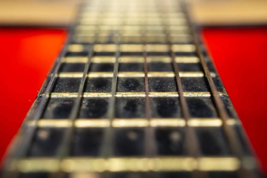 Acoustic guitar neck close up. guitar strings macro. musical instrument