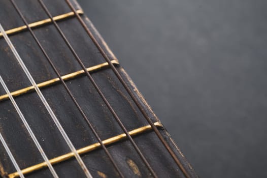 Acoustic guitar neck close up. guitar strings macro. musical instrument