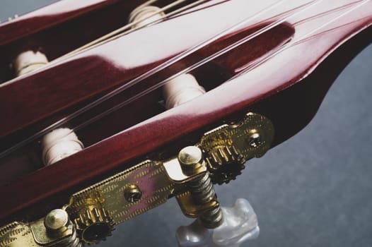Guitar headstock close up. acoustic musical instrument