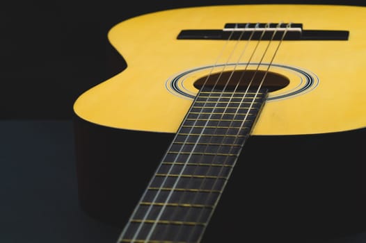 Guitar close up. acoustic musical instrument. strings on the guitar neck