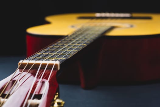 Guitar close up. acoustic musical instrument. strings on the guitar neck