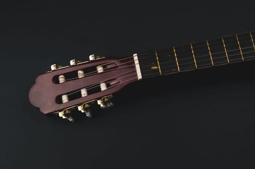 Guitar headstock close up. acoustic musical instrument. copy space