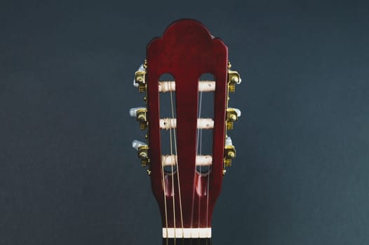 Guitar headstock close up. acoustic musical instrument. copy space