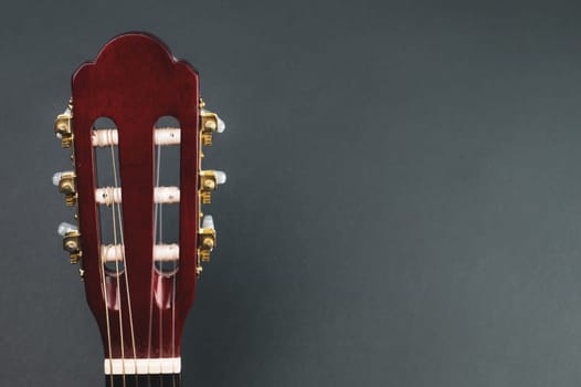 Guitar headstock close up. acoustic musical instrument. copy space