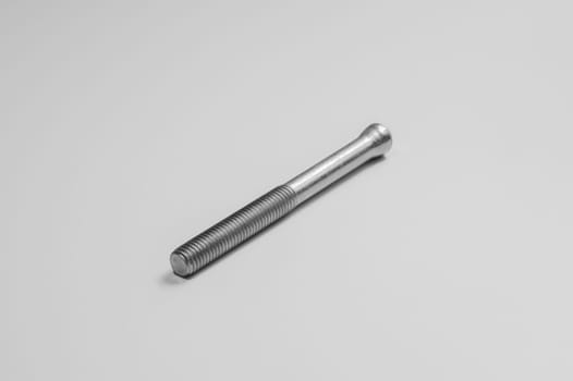 Steel screw on a white background. working tools