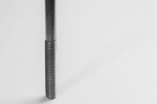 Steel screw on a white background. working tools