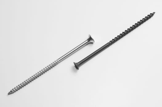Steel screw on a white background. working tools