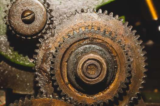 Gears of industrial machine. detail of mechanism. old cogwheels. mechanical parts of machinery