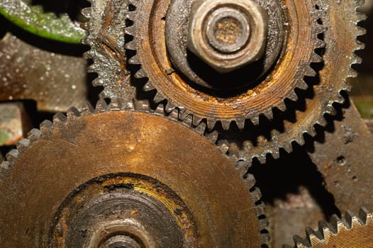 Gears of industrial machine. detail of mechanism. old cogwheels. mechanical parts of machinery