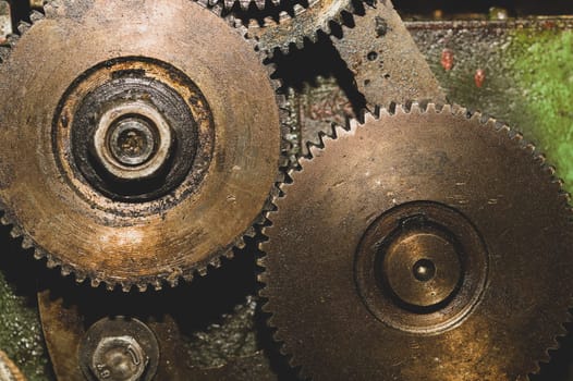 Gears of industrial machine. detail of mechanism. old cogwheels. mechanical parts of machinery