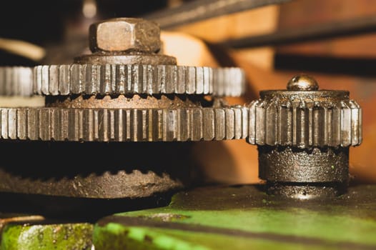 Gears of industrial machine. detail of mechanism. old cogwheels. mechanical parts of machinery