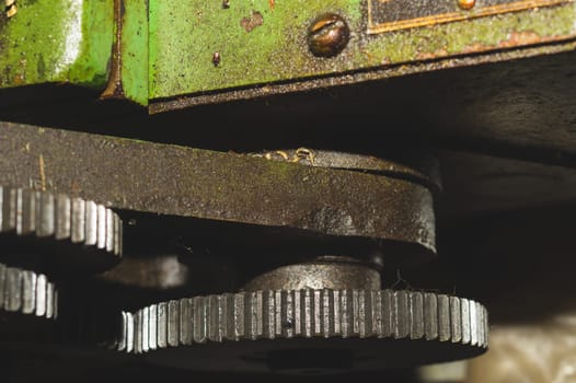 Gears of industrial machine. detail of mechanism. old cogwheels. mechanical parts of machinery