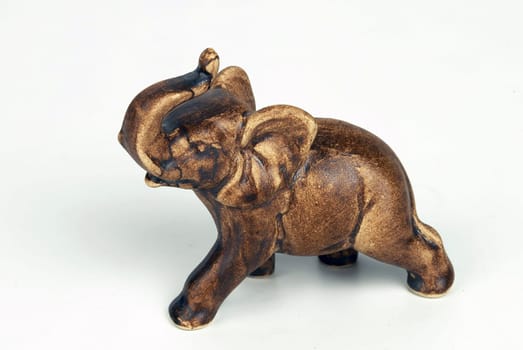 clay elephant on a white background