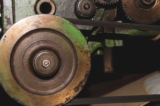 Gears of industrial machine. detail of mechanism. old cogwheels. mechanical parts of machinery