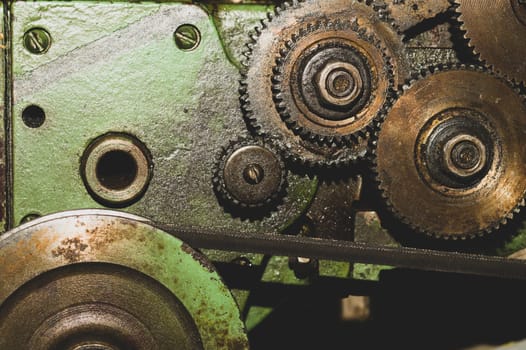 Gears of industrial machine. detail of mechanism. old cogwheels. mechanical parts of machinery