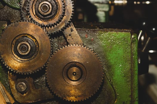 Gears of industrial machine. detail of mechanism. old cogwheels. mechanical parts of machinery