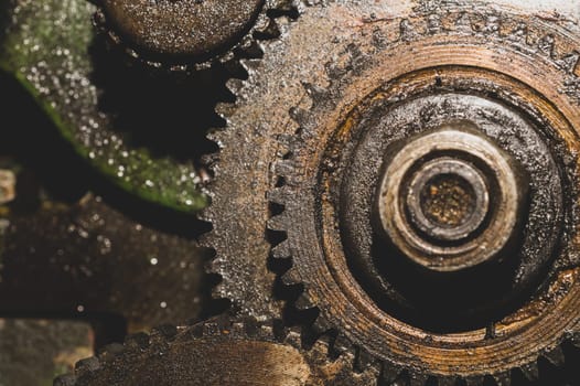 Gears of industrial machine. detail of mechanism. old cogwheels. mechanical parts of machinery
