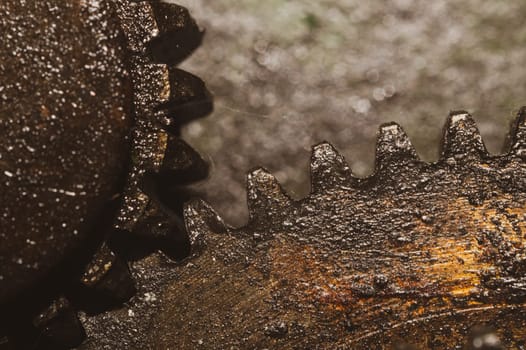 Gears of industrial machine. detail of mechanism. old cogwheels. mechanical parts of machinery