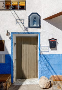 Trasmoz, Spain - October 7, 2021: Decoration and accreditation plaque of the first witch of the year in Trasmoz, the only municipality in Spain excommunicated by the Catholic Church.