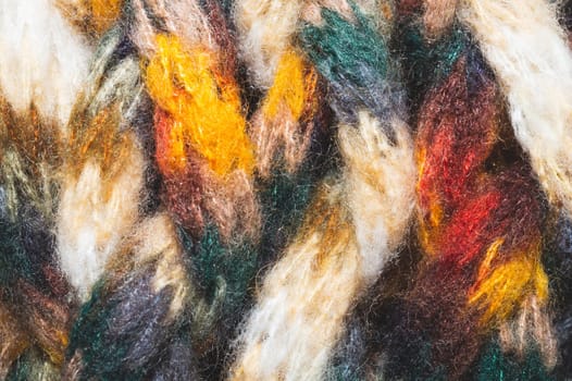 Colorful wool yarn. woolen fabric background. knitted textile close up