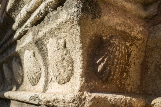 Church of Santiago. Carved shells outdoors, symbol of Saint James. Caceres, Extremadura, Spain