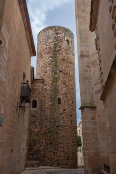 Palace of Carvajal twelfth-century round tower. One of the most emblematic building of monumental Complex of Caceres, Extremadura, Spain