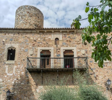 Caceres, Spain - Oct 1st, 2021: Palace of Carvajal garden. One of the most emblematic building of monumental Complex of Caceres, Extremadura, Spain