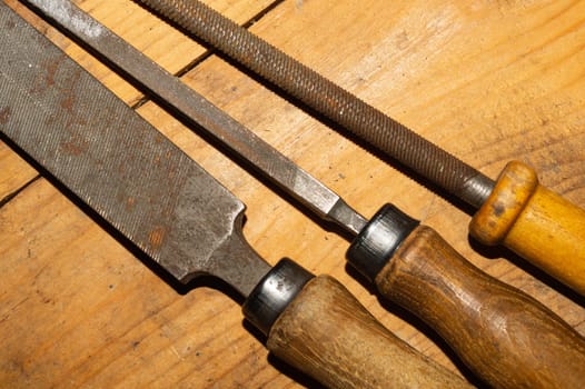 Old rasp. different carpentry files. various graters. instrument for wood processing. hand tools