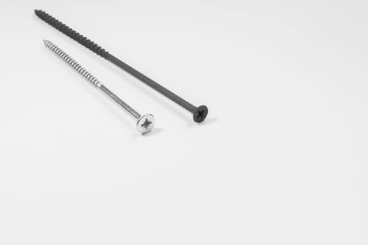 Steel screw on a white background. working tools