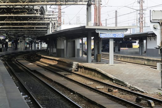 Rail tracks and trains in the Brussels South Railway Station