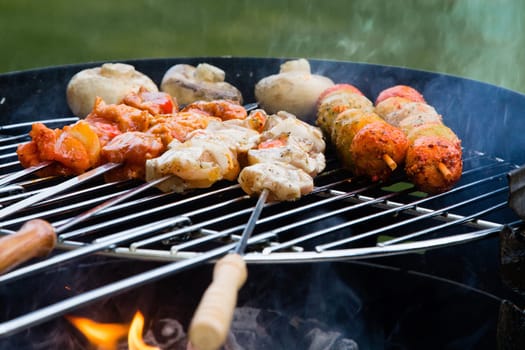 Grilled meat on a summer barbecue in the garden