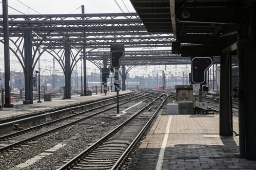 Rail tracks and trains in the Brussels South Railway Station